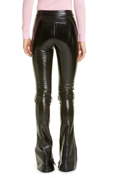 Shop Courrèges Zip Hem Vinyl Flare Trousers In Black