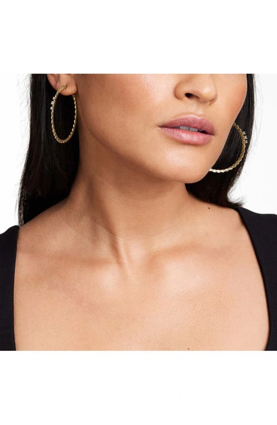 Shop Lana Jewelry Triple Solo Mega Diamond Hoop Earrings In Yellow