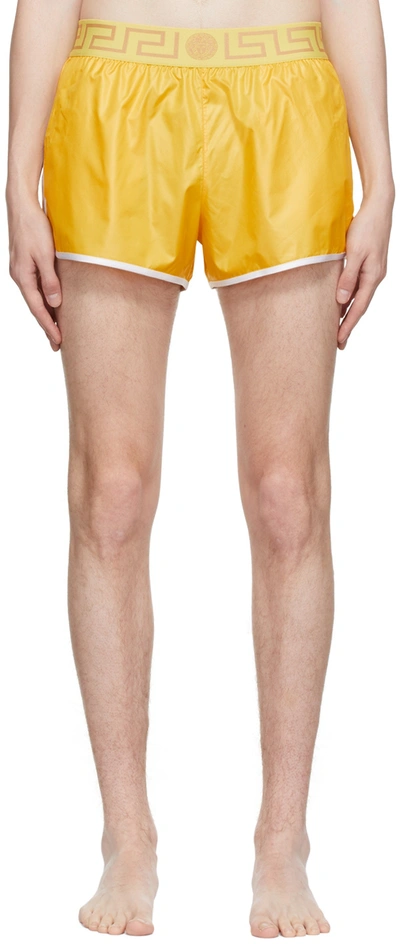 Shop Versace Yellow Greca Swim Shorts In 2y460 Yellow