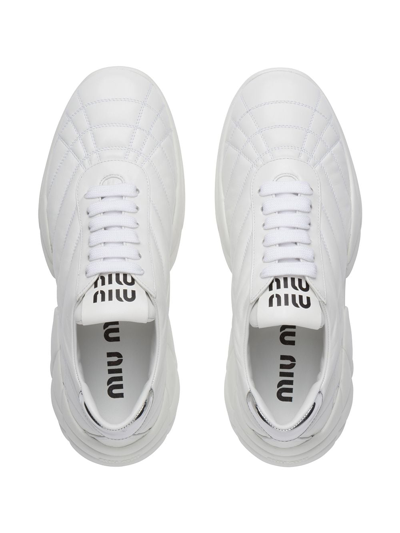 Shop Miu Miu Leather Low-top Sneakers In White