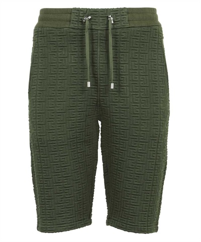Shop Balmain Monogram Textured Shorts In Green