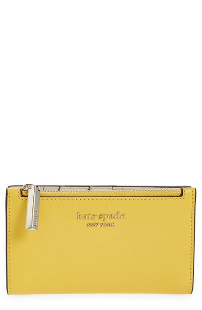 Shop Kate Spade Small Spencer Slim Leather Bifold Wallet In Morning Light