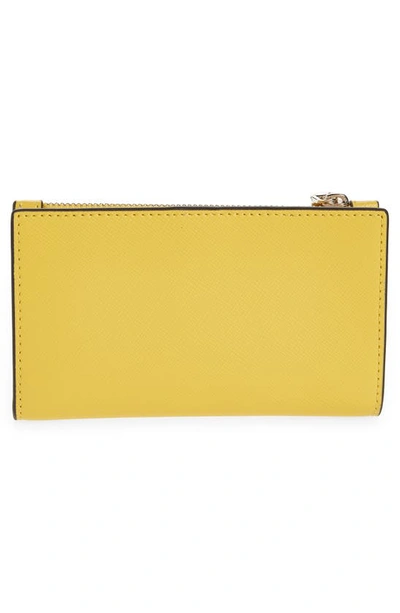 Shop Kate Spade Small Spencer Slim Leather Bifold Wallet In Morning Light