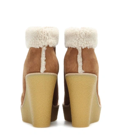 Shop Chloé Suede And Shearling Wedge Ankle Boots In Female