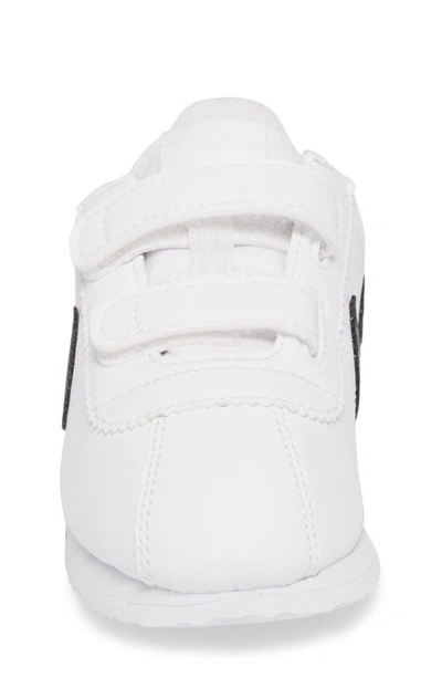 Shop Nike Cortez Basic Sl Sneaker In White/ Black