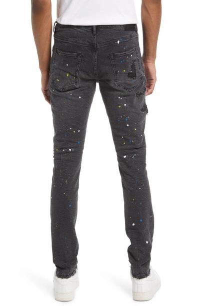 Super Skinny Busted Knee Paint Splatter Jeans