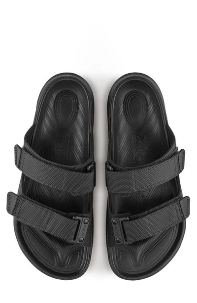 Shop Birkenstock Atacama Slide Sandal In Futura Black