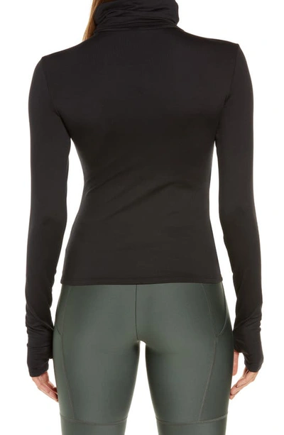 Shop Alo Yoga Soft Protection Long Sleeve Turtleneck Top In Black