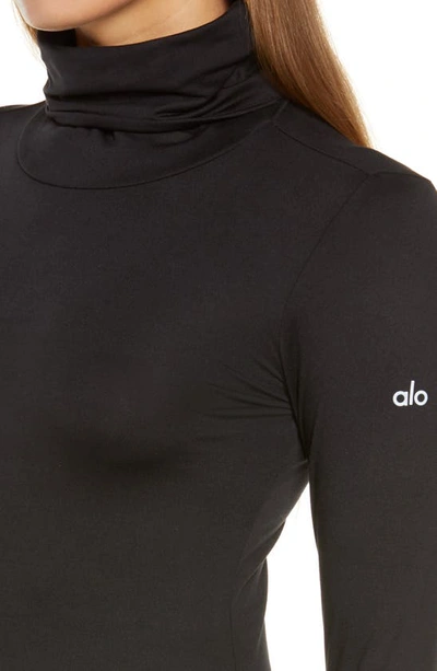 Shop Alo Yoga Soft Protection Long Sleeve Turtleneck Top In Black