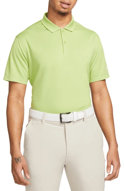 Shop Nike Dri-fit Piqué Golf Polo In Vivid Green/ White