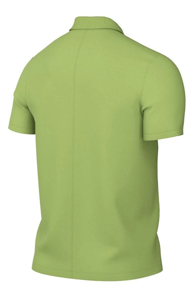 Shop Nike Dri-fit Piqué Golf Polo In Vivid Green/ White
