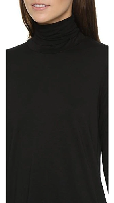 Shop Three Dots Relaxed Hi Lo Turtleneck In Black