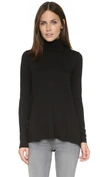Three Dots Relaxed Hi Lo Turtleneck In Black