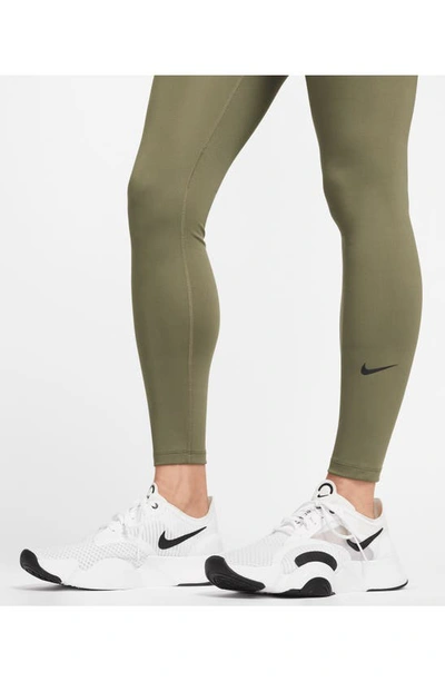 Shop Nike Maternity Performance Leggings In Medium Olive/ Black