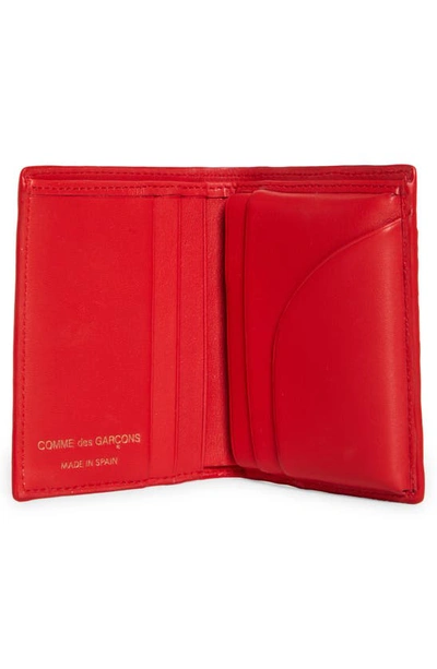 Shop Comme Des Garçons Roots Embossed Leather Bifold Wallet In Red