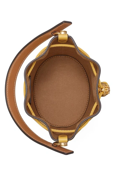 Shop Tory Burch T Monogram Perforated Leather Mini Bucket Bag In Golden Sunset