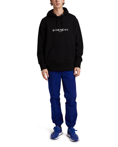 Shop Givenchy Men's Reverse-logo Pullover Hoodie In Black