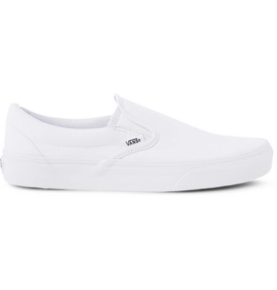 Shop Vans Classic Canvas Slip-on Sneakers