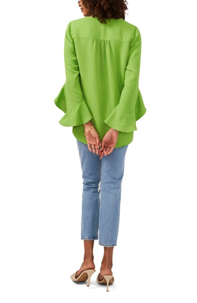 Shop Vince Camuto Flutter Sleeve Tunic In Kiwi