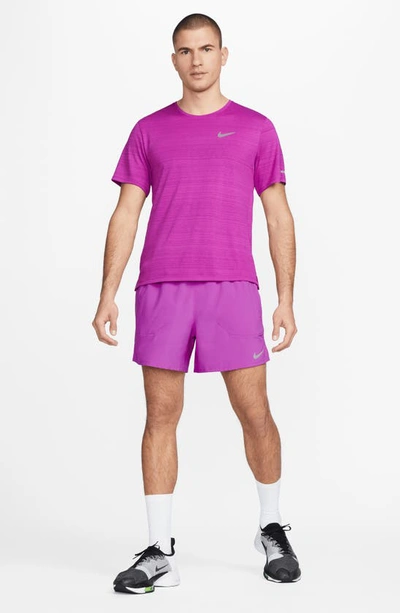 Shop Nike Dri-fit Stride 5-inch Running Shorts In Vivid Purple/ Deep Royal Blue