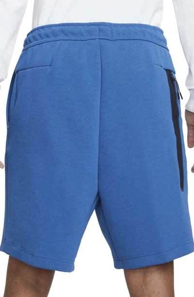 Shop Nike Sportswear Tech Fleece Shorts In Dark Marina Blue/ Light Bone