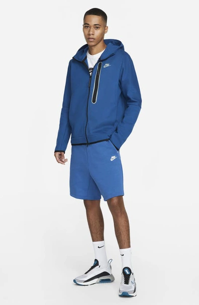 Shop Nike Sportswear Tech Fleece Shorts In Dark Marina Blue/ Light Bone