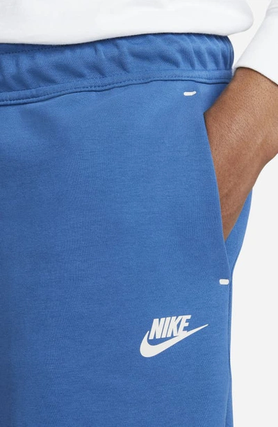 Shop Nike Sportswear Tech Fleece Shorts In Dark Marina Blue/ Light Bone