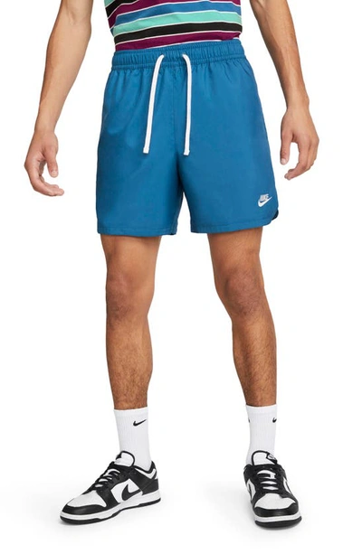 Shop Nike Woven Lined Flow Shorts In Dk Marina Blue/ White