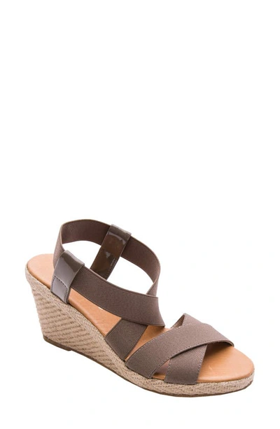 Shop Andre Assous Dalmira Wedge Sandal In Taupe