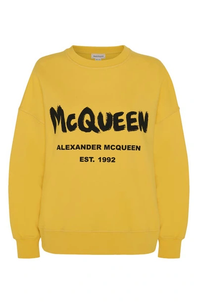 Shop Alexander Mcqueen Graffiti Logo Oversize Cotton Sweatshirt In Pop Yellow / Black