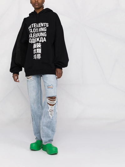 Shop Vetements Logo-print Oversized Hoodie In 黑色