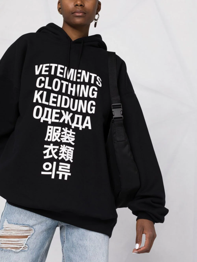 Shop Vetements Logo-print Oversized Hoodie In 黑色