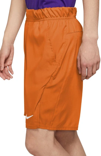 Shop Nike Court Dri-fit Victory Athletic Shorts In Magma Orange/ White