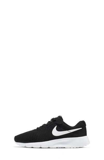 Shop Nike Tanjun Sneaker In Black/ White