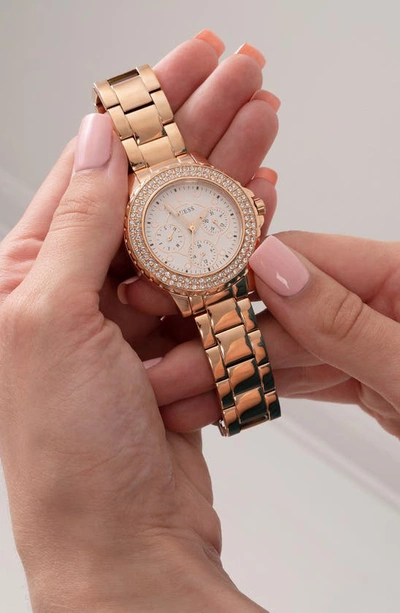 Shop Guess Rhinestone Multifunction Bracelet Watch, 36mm In Rose Gold Tone