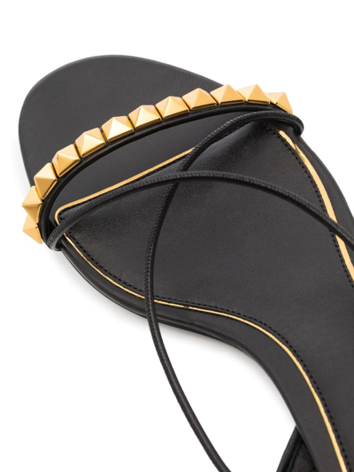 Shop Valentino Rockstud Gladiator Flat Sandals In Black