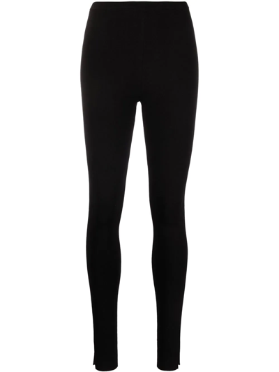 Shop Totême Mid-rise Skinny-cut Leggings In Black