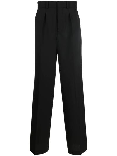 Shop Nanushka Pleat-detail Wide-leg Trousers In Black