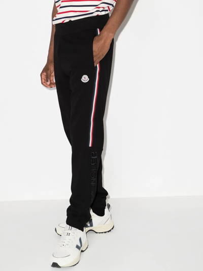 Shop Moncler Logo Patch Track Pants In Black