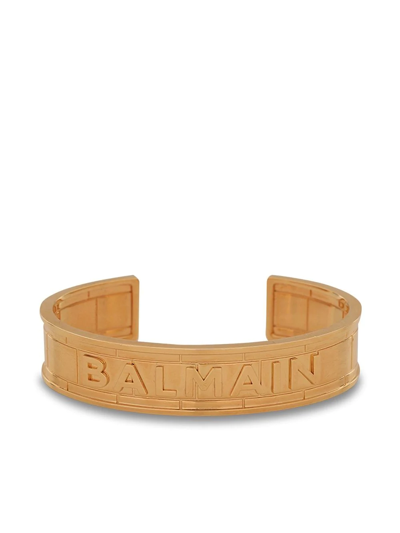 Shop Balmain Logo-debossed Cuff Bracelet In Gold
