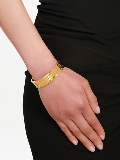 Shop Balmain Logo-debossed Cuff Bracelet In Gold