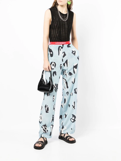 Shop Charles Jeffrey Loverboy Abstract-print Logo-waist Trousers In 蓝色
