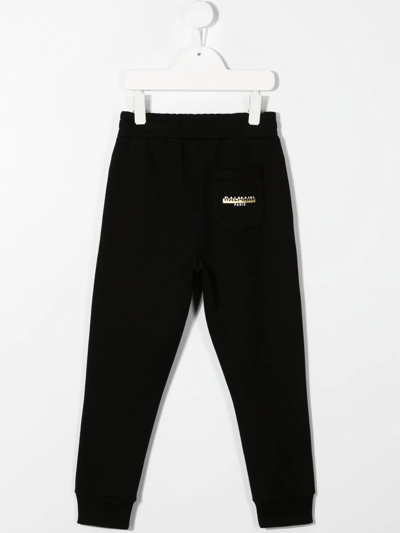 Shop Balmain Gold-tone Logo Track Pants In 黑色