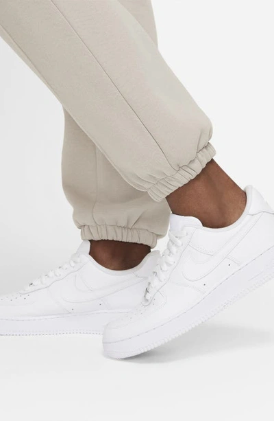 Shop Nike Sportswear Essential Fleece Pants In Cream/ White