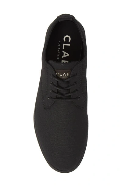 Shop Clae Ellington Sneaker In Black Waxed Canvas Black