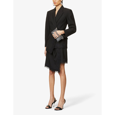 Shop Alexander Mcqueen Asymmetric-hem Lace-trimmed Wool Mini Skirt In Black