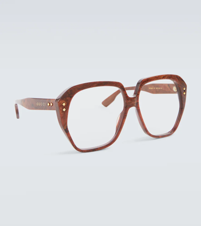 Shop Gucci Oversized Geometric Glasses In Brown-brown-yellow