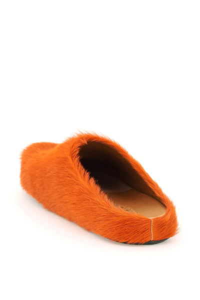 Shop Marni Fussbett Clogs In Orange