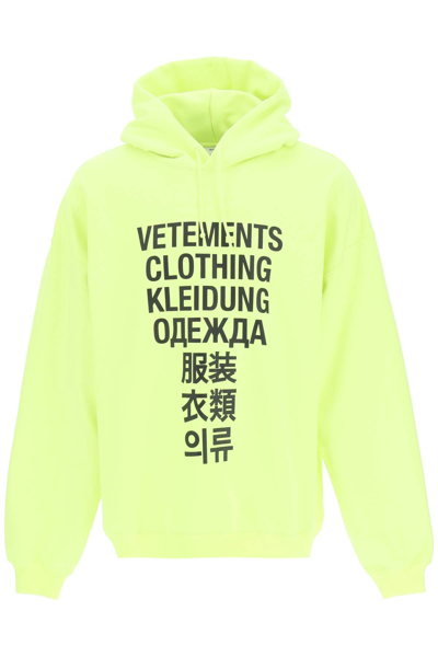 Shop Vetements Translation Logo Print Hoodie In Yellow