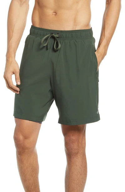 Shop Alo Yoga Unity 2-in-1 Shorts In Hunter